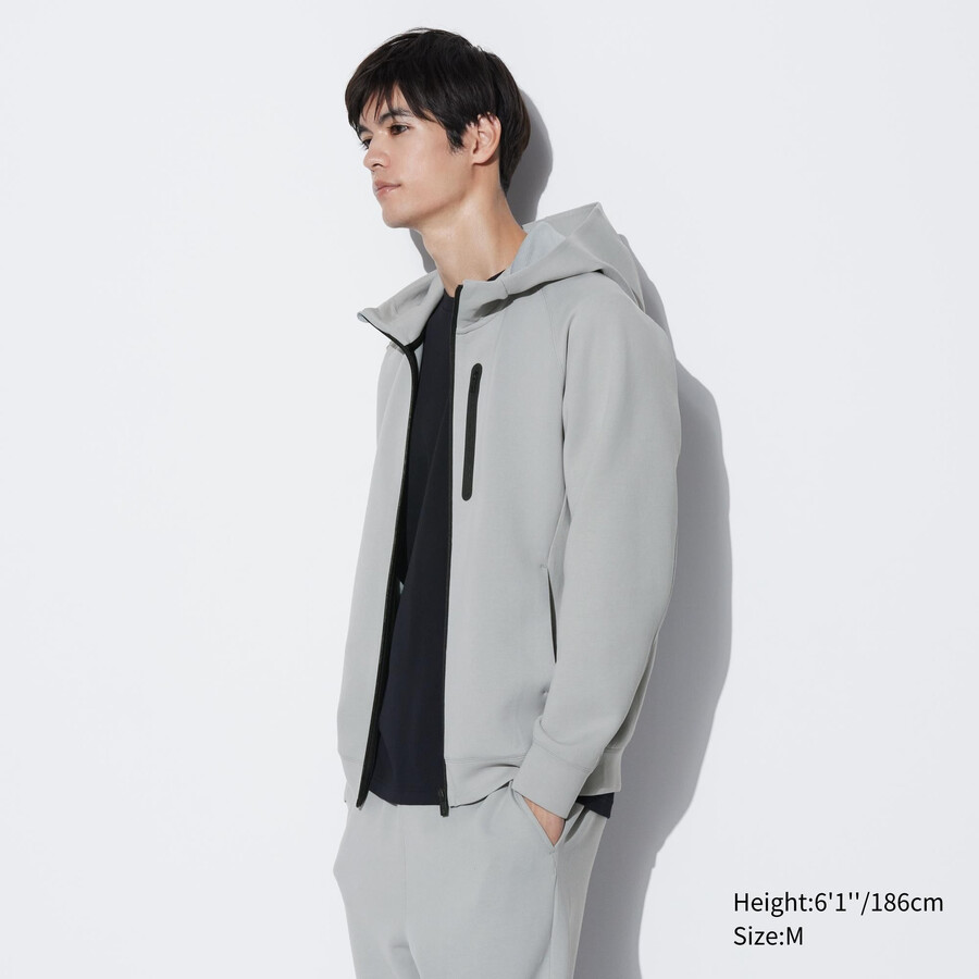 svetlo siva moška jopa z zadrgo uniqlo dry stretch