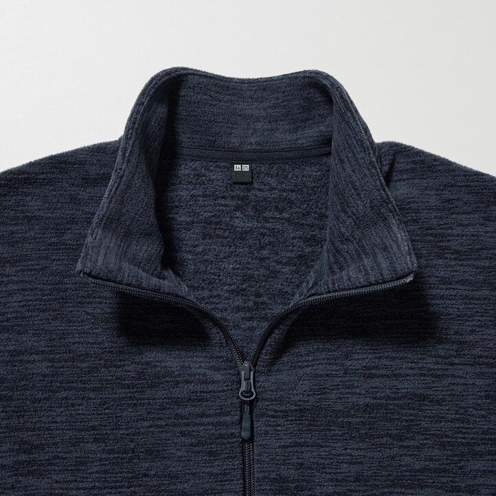 moške bele flis jakne z zadrgo uniqlo heather