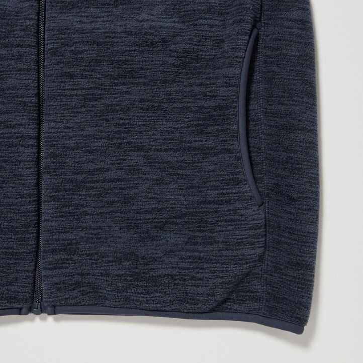 moške bele flis jakne z zadrgo uniqlo heather