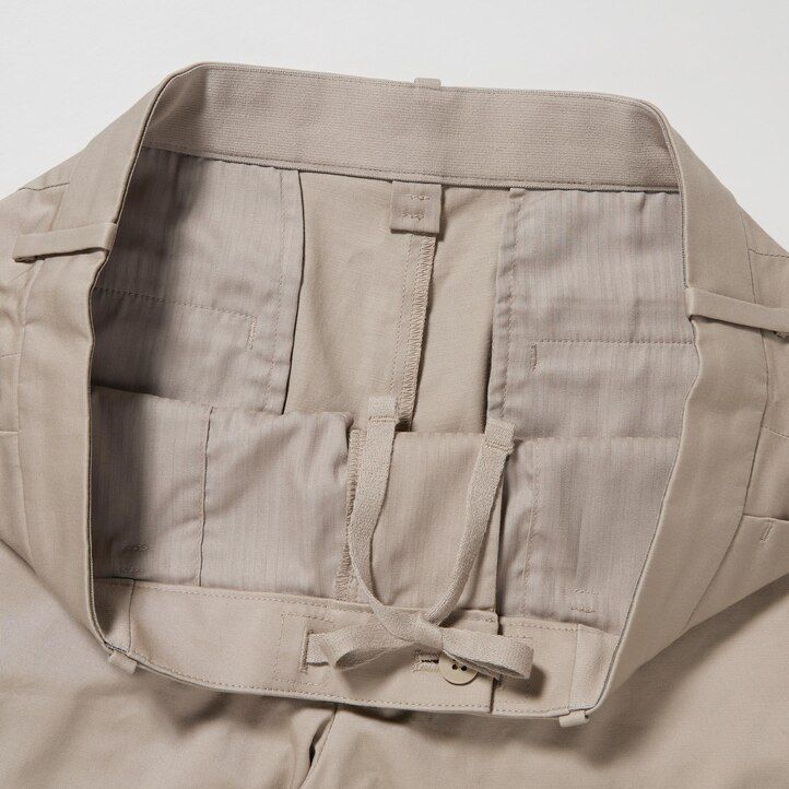 moške hlače uniqlo stretch slim fit sive