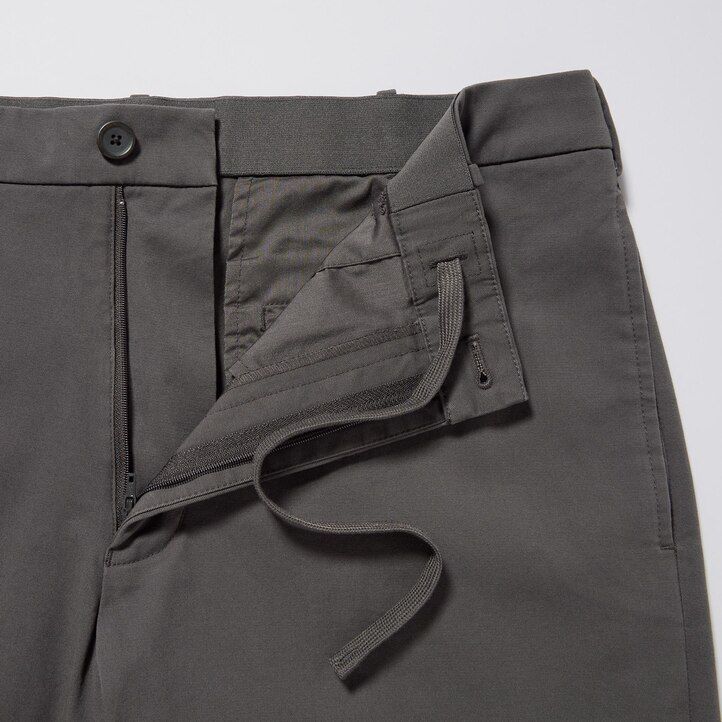 moške elegantne bombažne hlače uniqlo do gležnjev bež barve