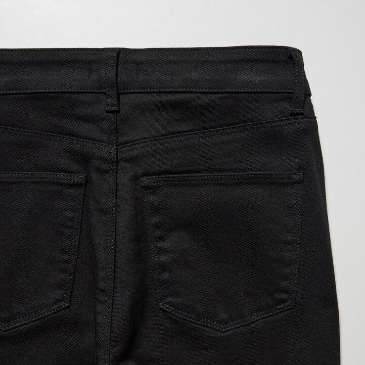 modre ženske kavbojke uniqlo ultra stretch z visokim pasom in oprijetim krojem