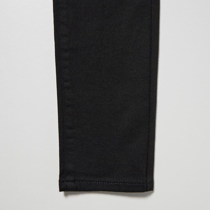 modre ženske kavbojke uniqlo ultra stretch z visokim pasom in oprijetim krojem