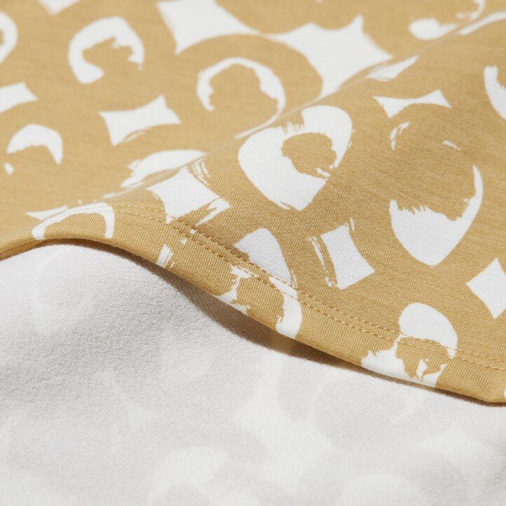 termo majice uniqlo heattech swirl print z rokavi ženske črne