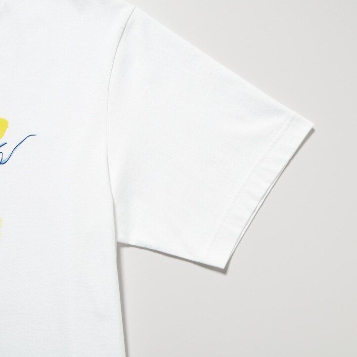 bele ženske majice uniqlo peace for all z grafiko ines de la fressange