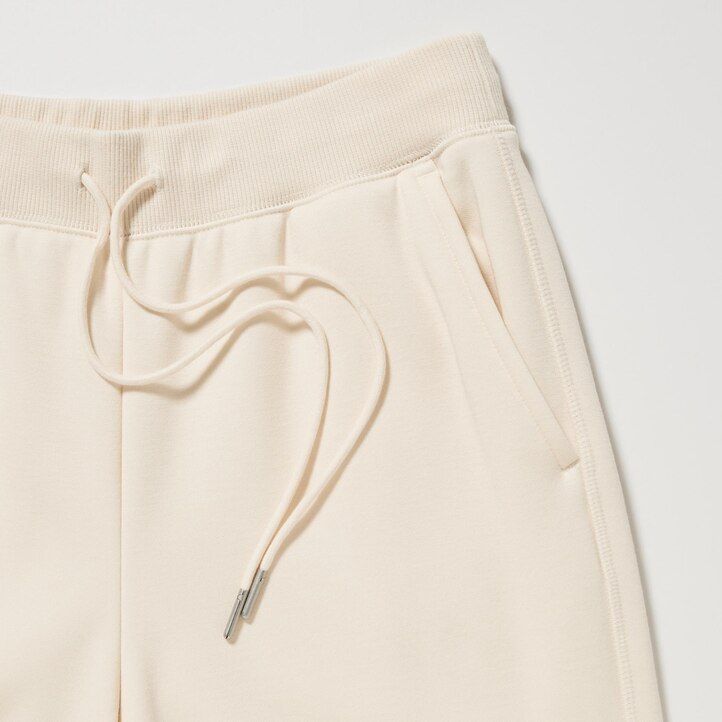 beli ženski topovi uniqlo heattech s podlogo iz pilaste tkanine